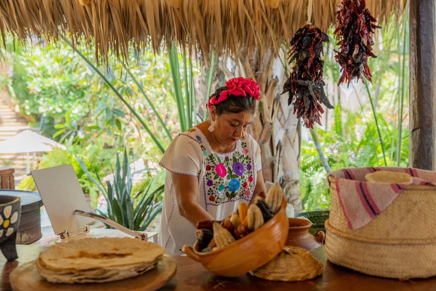 Cook preparing tortillas